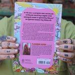 A woman holding the Women Living Deliciously Hardcover Book.