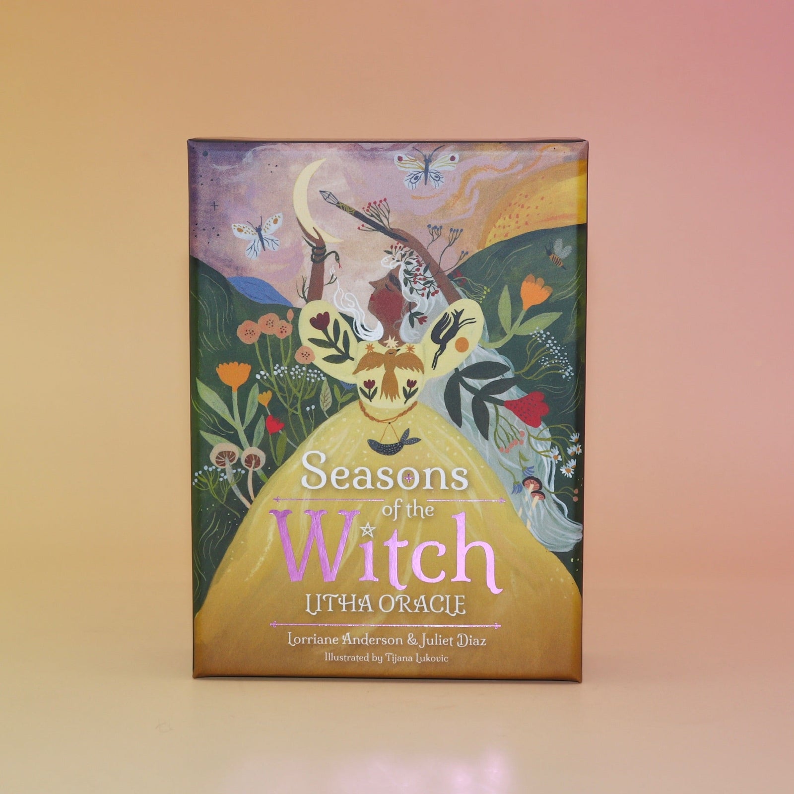 The Seasons of the Witch - Litha Oracle by Lorriane Anderson on a peach-colored background.