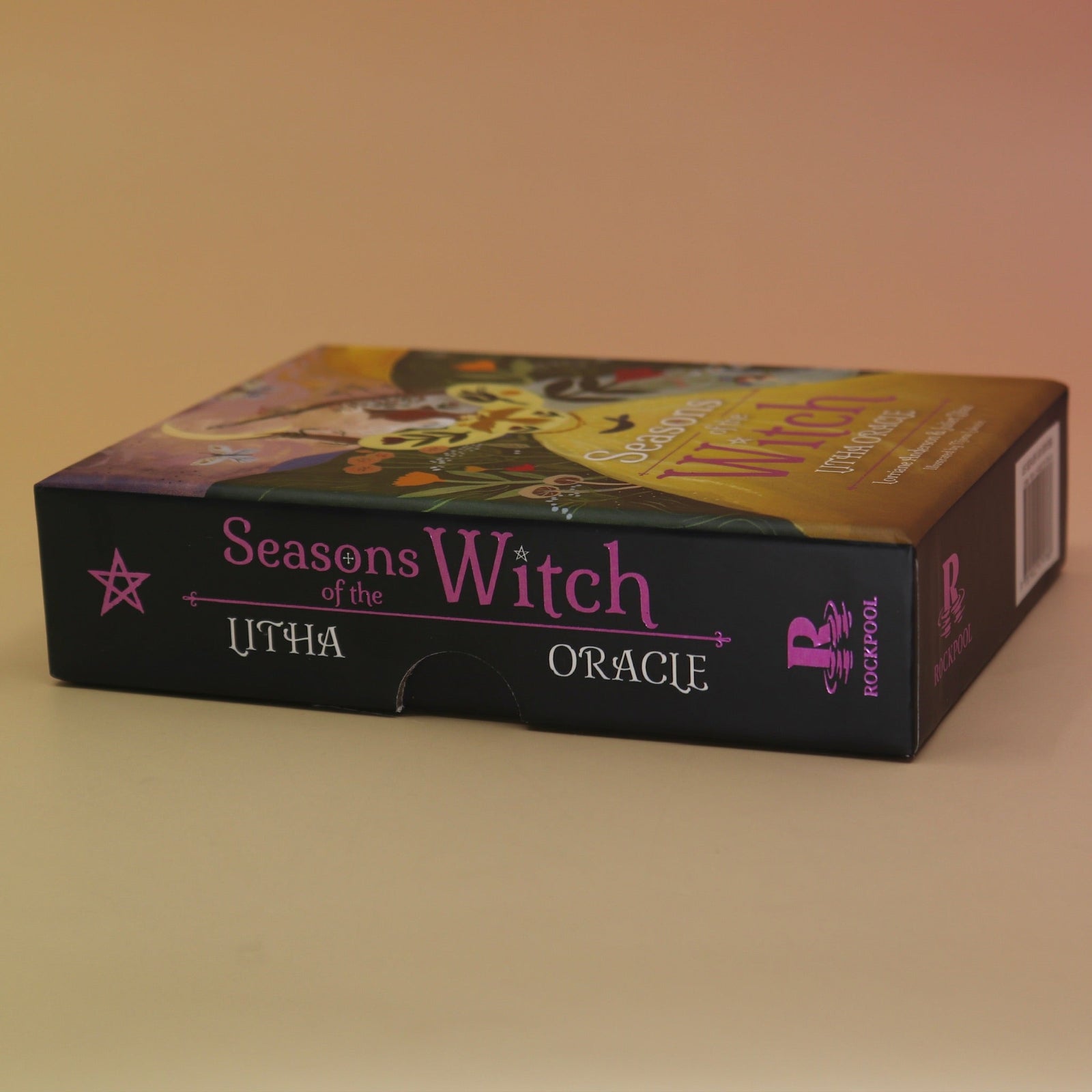 The Seasons of the Witch - Litha Oracle by Lorriane Anderson on a peach-colored background.