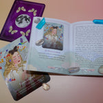 A card from the Seasons of the Witch - Litha Oracle Card Deck with its respectful page in the guidebook surrounded by crystals.