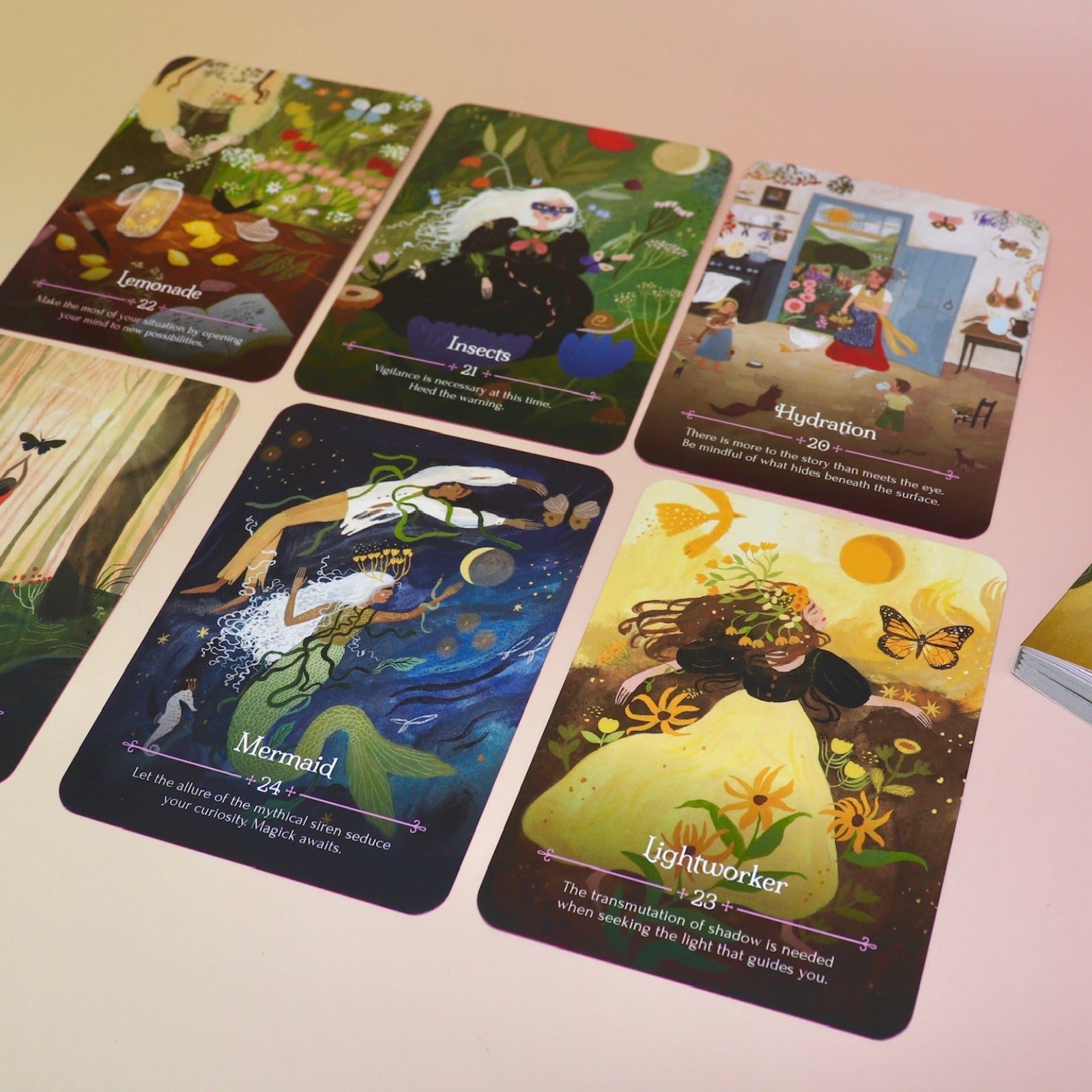 The contents of the Seasons of the Witch - Litha Oracle Card Deck.