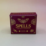 The Spells A Little Deck of Enchantment Spell Deck on a pink and yellow background.