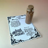 The Cinnamon Blowing Ritual Kit on a pink and yellow background.