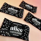The Nightcap Single Chocolates — Mushroom Chocolates for Deep Sleep on a pink background.