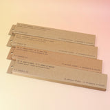 All four P.F. Candle Co. incense (Amber & Moss, golden Coast, Teakwood & Tobacco, and Ojai Lavender) on a pink and yellow background.