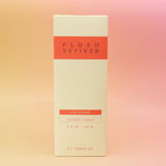 The Plush Vetiver - HI-FI Reed Diffuser box all on a pink and yellow background.