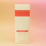 The Plush Vetiver - HI-FI Reed Diffuser box all on a pink and yellow background.