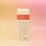 The back of the Blonde Hinoki – HI-FI Reed Diffuser box on a pink and yellow background.