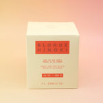 The Blonde Hinoki - HI-FI Soy Wax Candle box on a pink and yellow background.