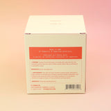 The back of the Smoked Cherry - HI-FI Soy Wax Candle box on a pink and yellow background.