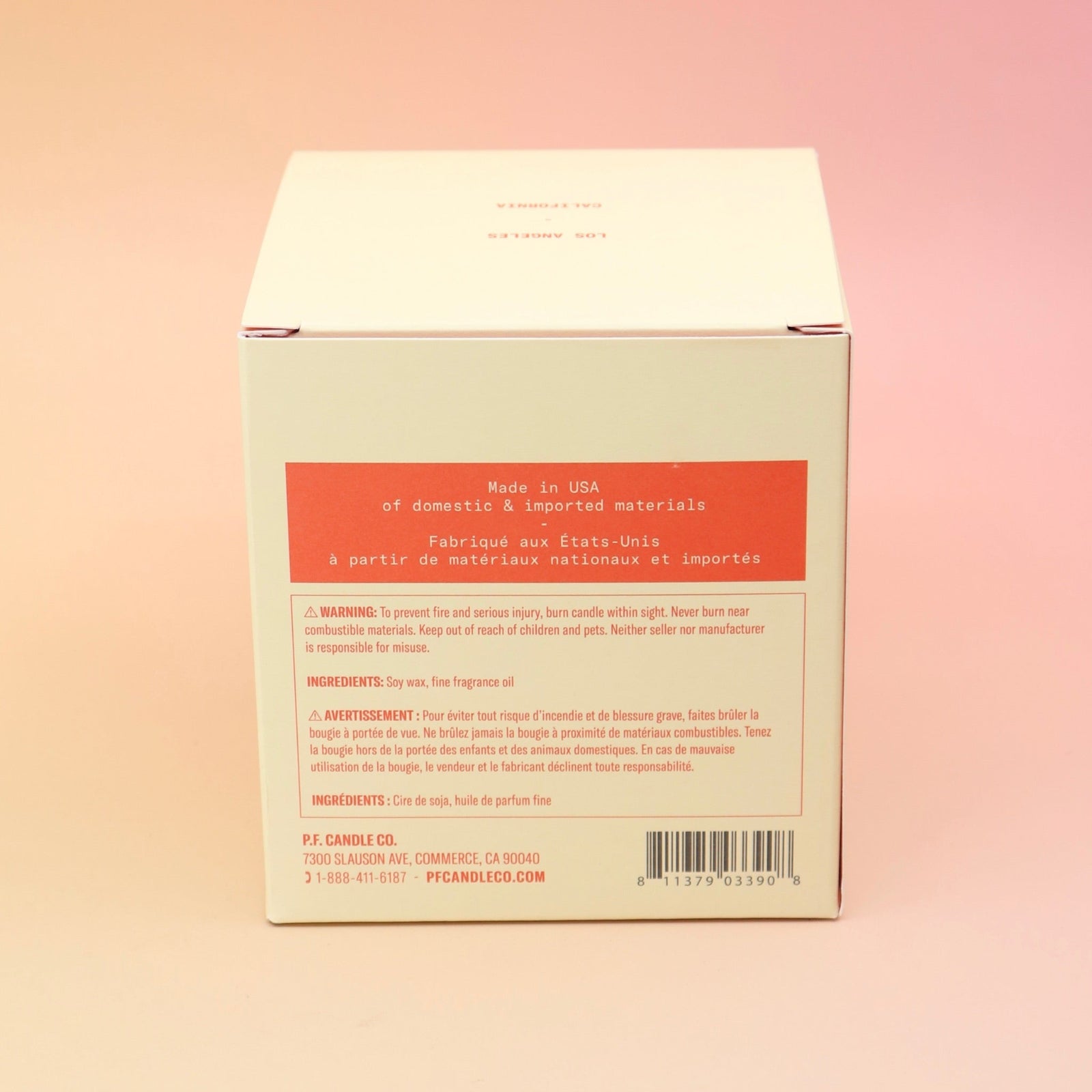 The back of the Smoked Cherry - HI-FI Soy Wax Candle box on a pink and yellow background.