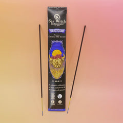 The Lammas Premium Floral Charcoal Incense on a pink and yellow background.