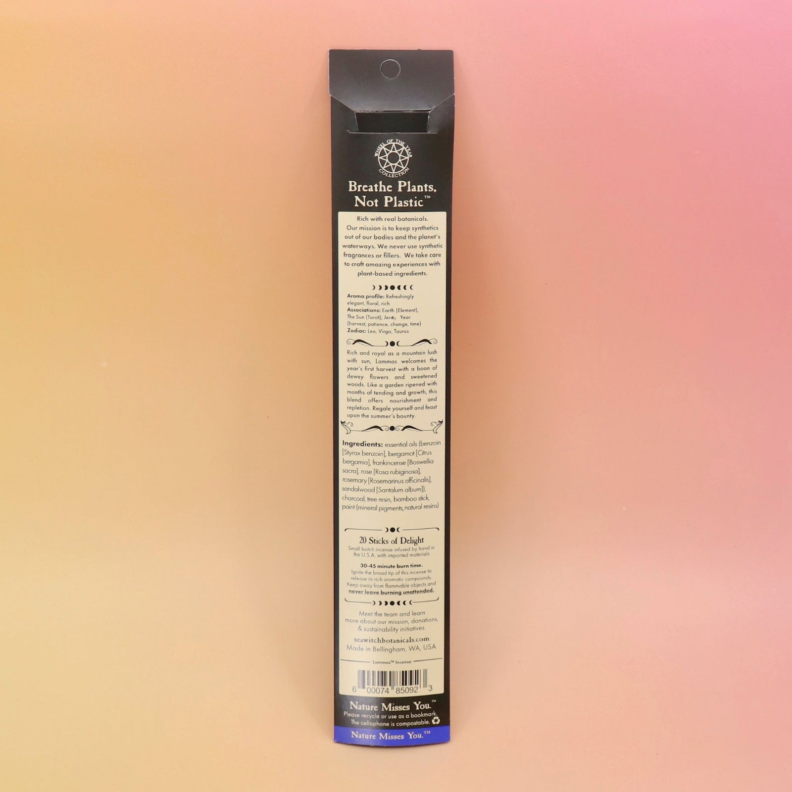 The back of the Lammas Premium Floral Charcoal Incense on a pink and yellow background.
