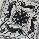 An up close image of the Screenprinted Chat Noir Cotton Bandana.