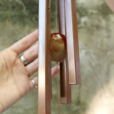 An up-close image of the Woodstock Amber Wind Chime.