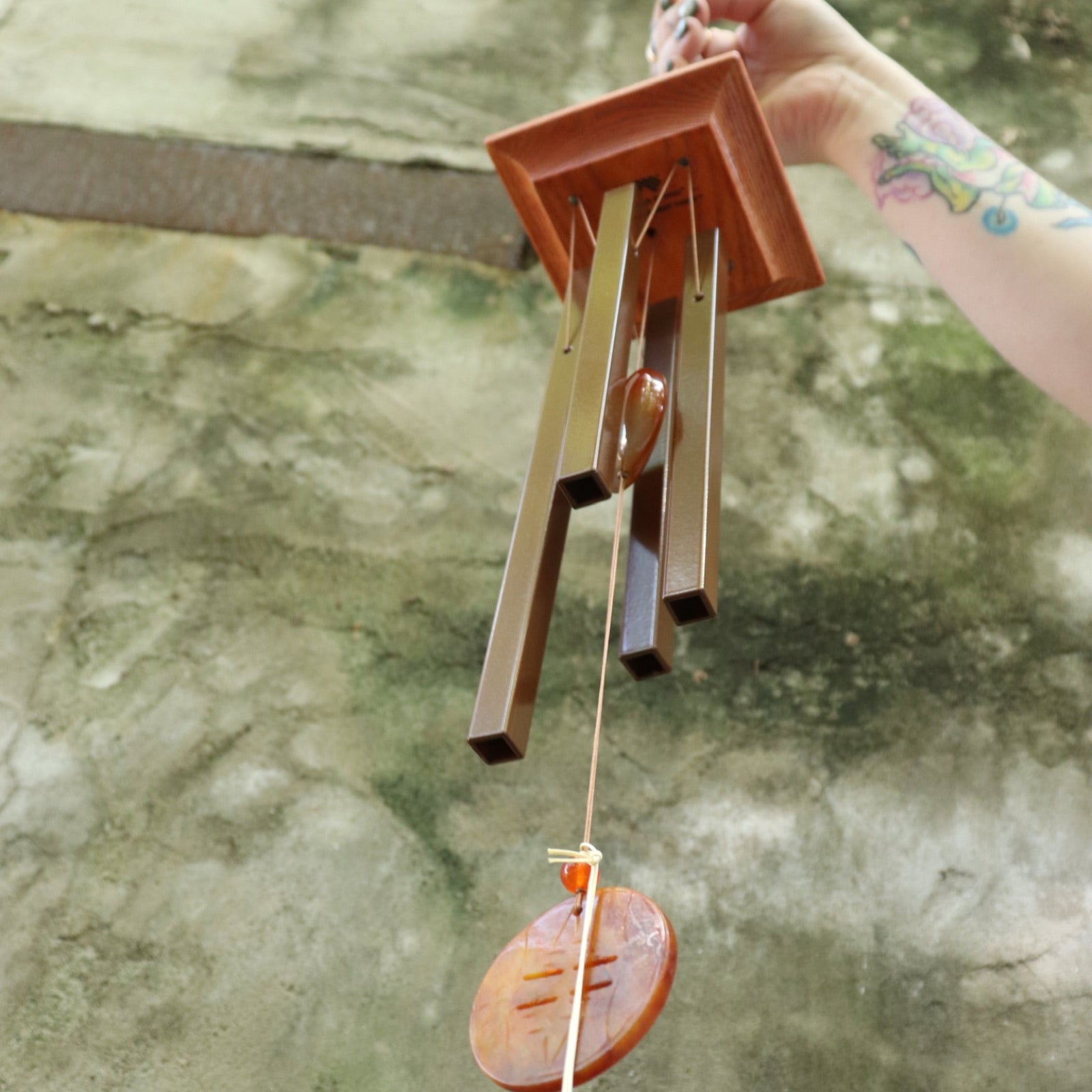 An up-close image of the Woodstock Amber Wind Chime.