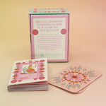 The contents of the Squid Cake Marseille Tarot Deck all on a pink and yellow background.