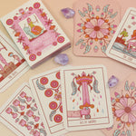 The contents of the Squid Cake Marseille Tarot Deck all on a pink and yellow background.