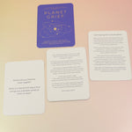 The contents of the Planet Grief Card Deck Bereavement Resource on a pink and yellow background.