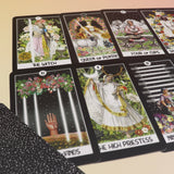 The contents of the Intuitive Night Goddess Tarot Deck on a pink and yellow background.