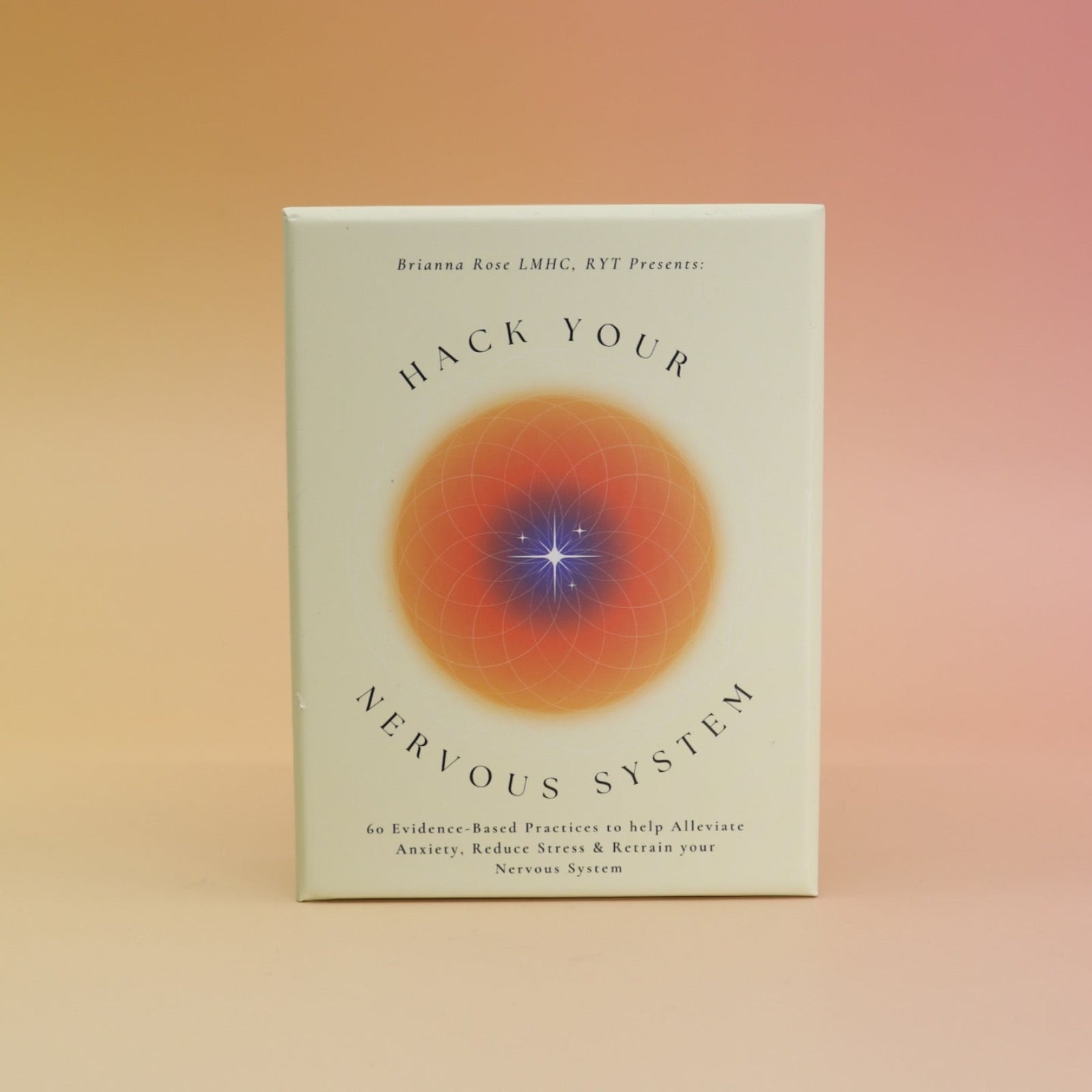 The Hack Your Nervous System card deck on a pink and yellow background.