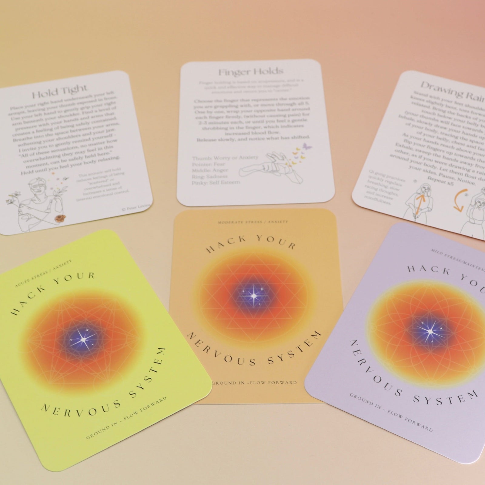 The contents of the Hack Your Nervous System card deck on a pink and yellow background.