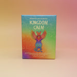The Kingdom Calm Card Deck on a pink and yellow background.