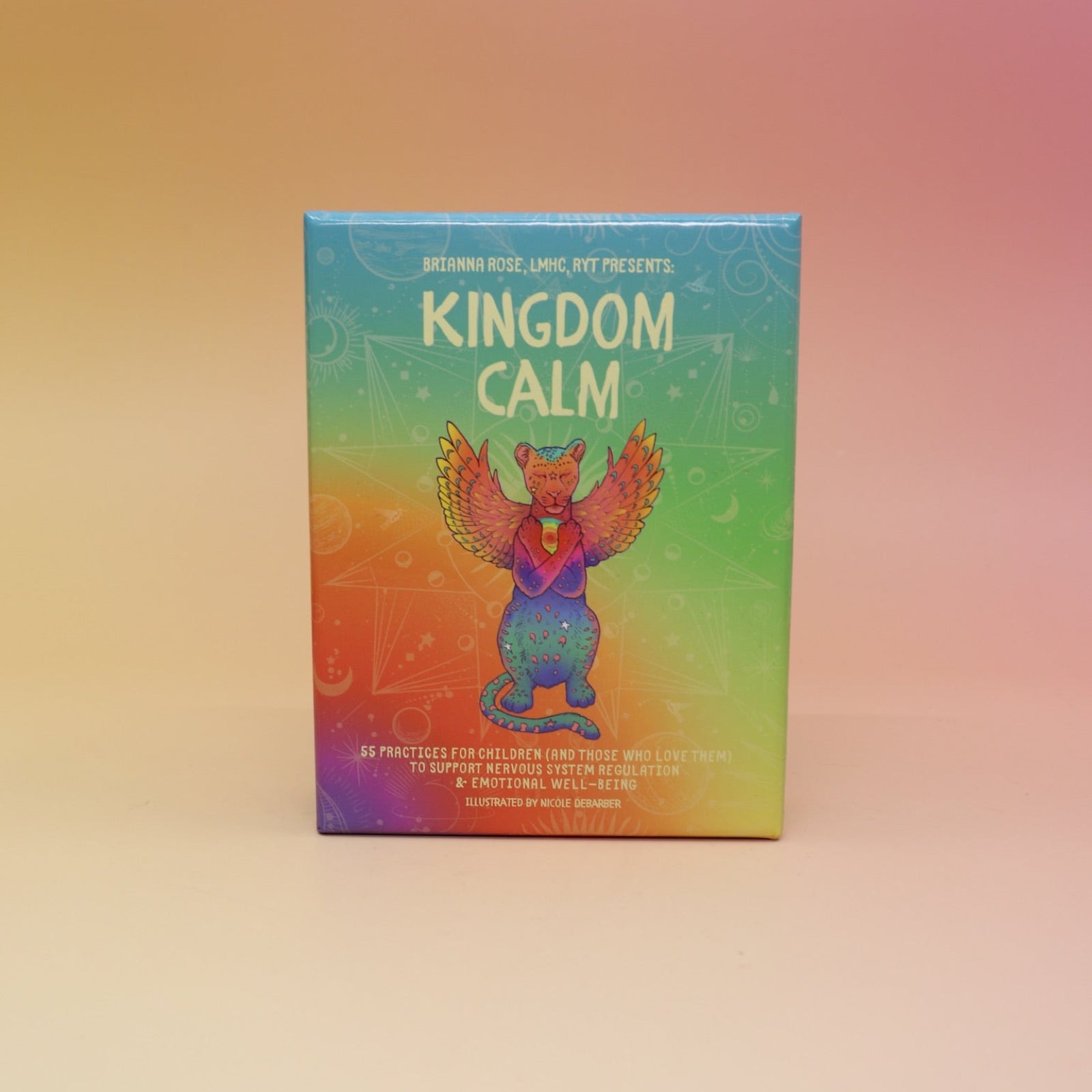 The Kingdom Calm Card Deck on a pink and yellow background.