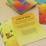 The contents of the Kingdom Calm Card Deck on a pink and yellow background.
