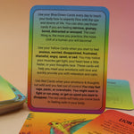 The contents of the Kingdom Calm Card Deck on a pink and yellow background.