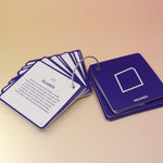 The flashcards from the Palmistry Flashcards by Anna Comerford on a pink and yellow background.