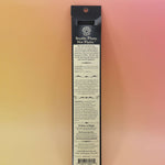 back of the pack of litha incense showcasing ingredients on an orange and pink background