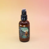 Litha room spray bottle on an orange and pink backbround
