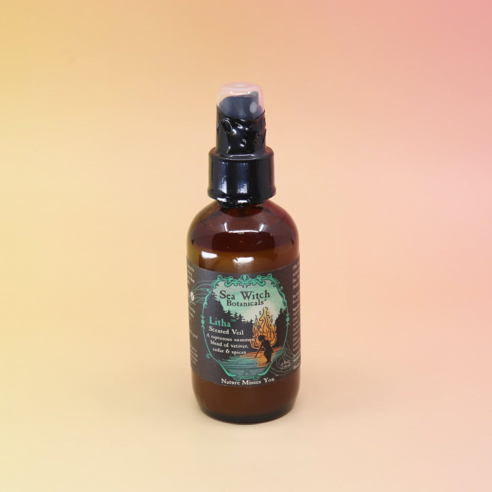 Litha room spray bottle on an orange and pink backbround