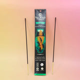 pack of incense with 2 sticks on either side on an orange and pink background