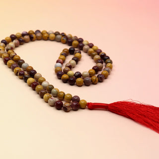 Mookaite Jasper 108 Mala Necklace on pink and orange background