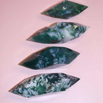 Moss Agate Prism on pink background