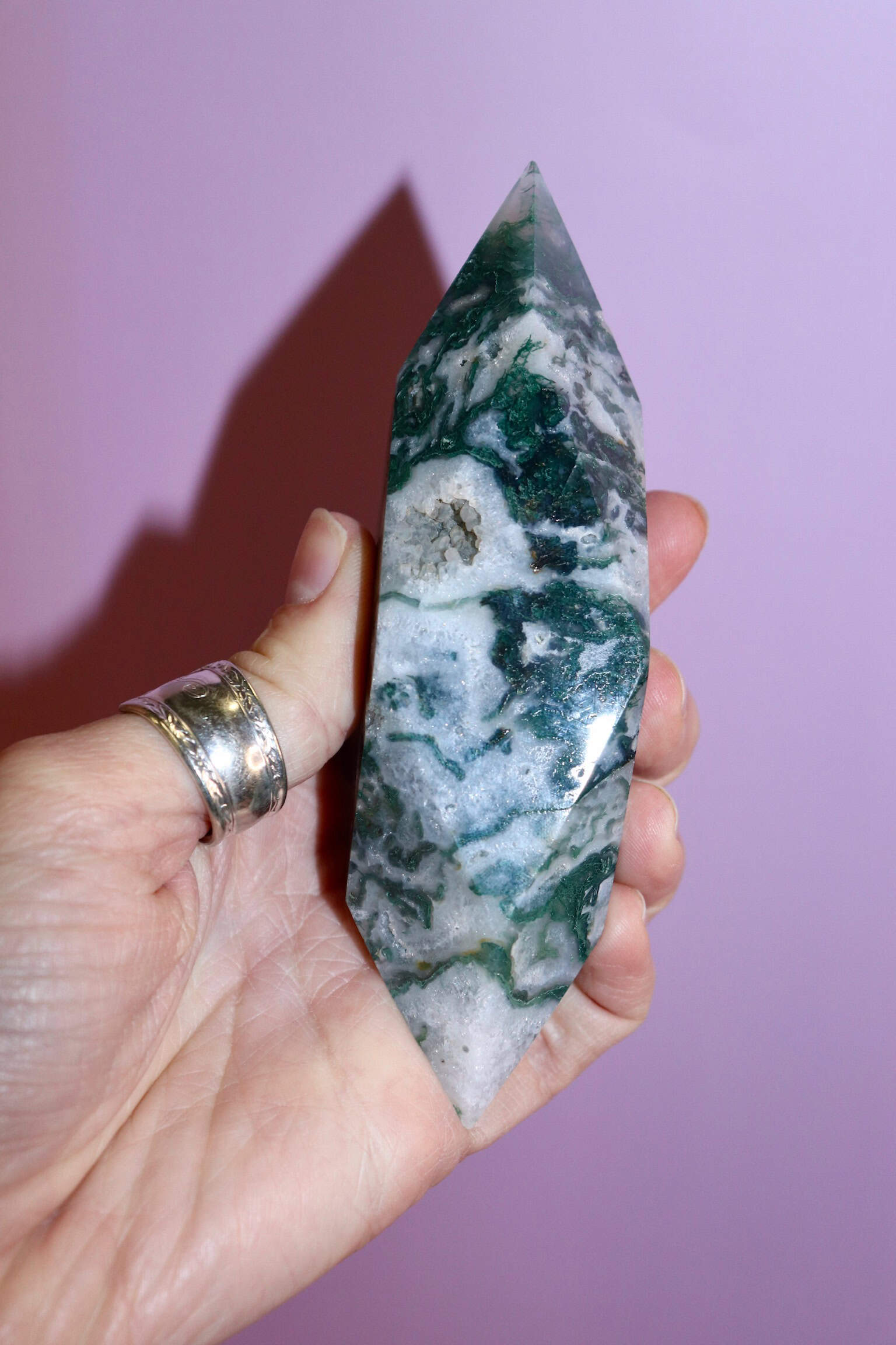 Moss Agate Prism on pink background