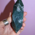 Moss Agate Prism on pink background