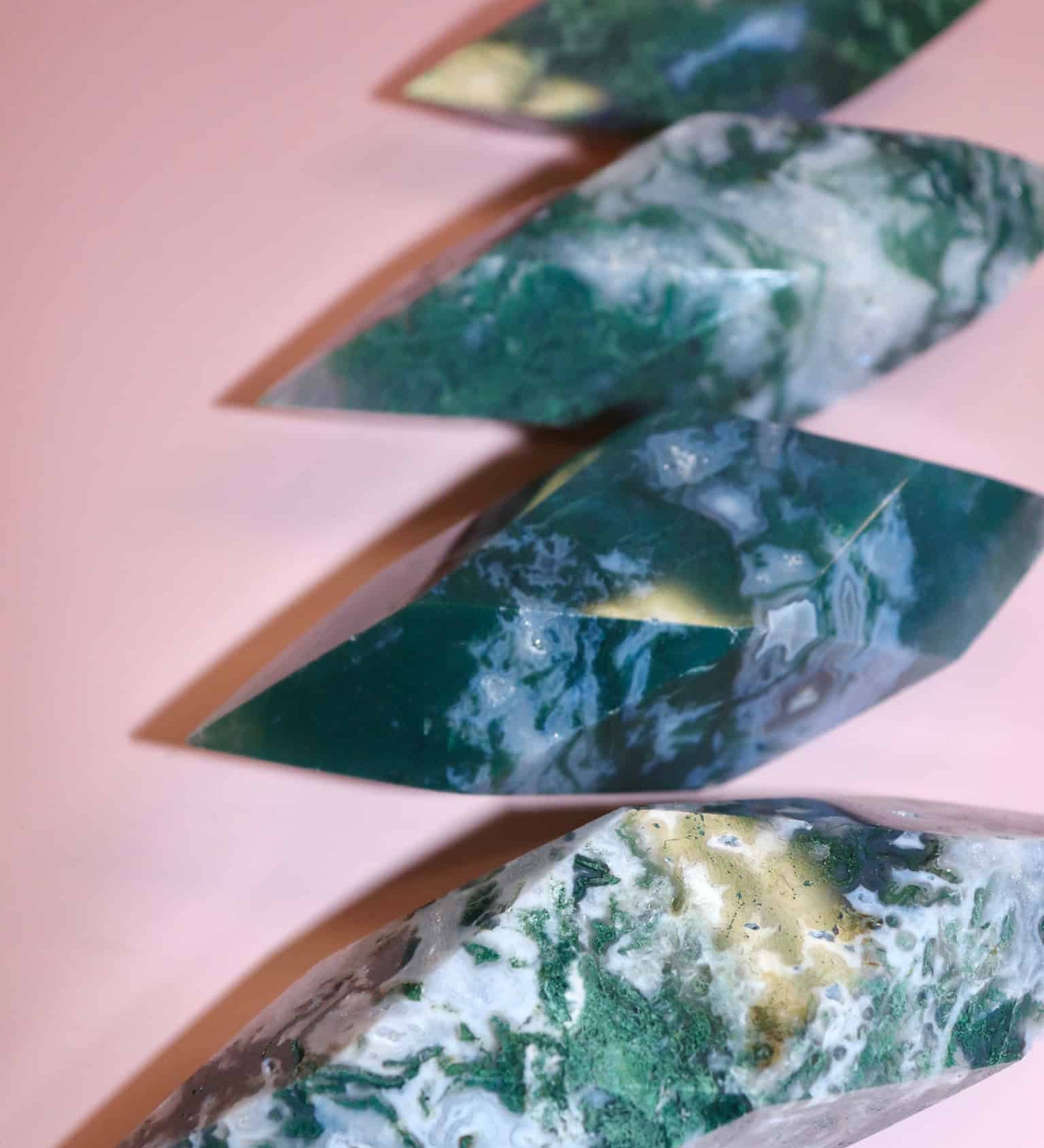 Moss Agate Prism on pink background
