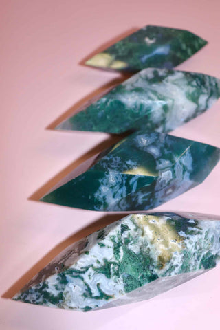 Moss Agate Prism on pink background