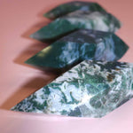 Moss Agate Prism on pink background