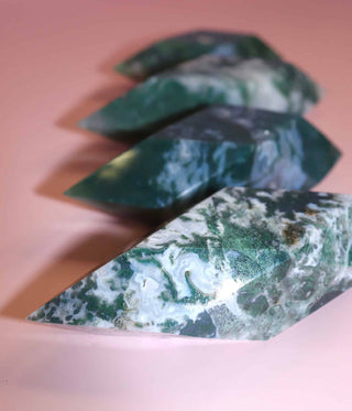 Moss Agate Prism on pink background