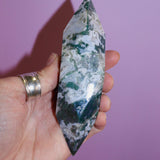 Moss Agate Prism on pink background