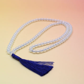 Opalite 108 Mala Necklace on orange and pink background
