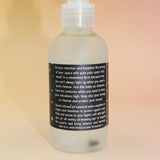 Bottle with a label on a beige background