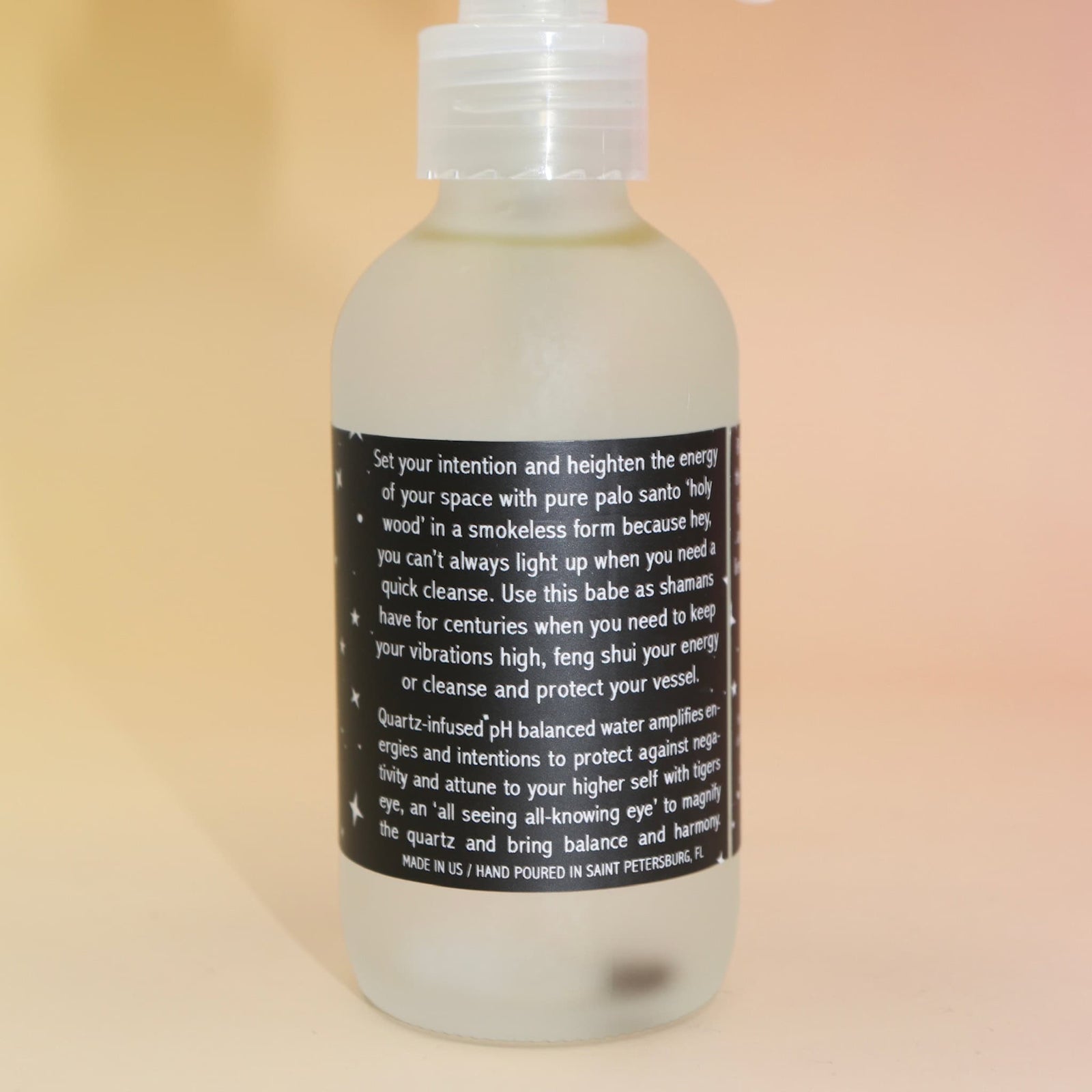 Bottle with a label on a beige background