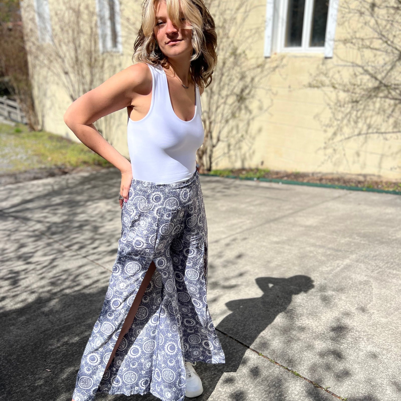 Someone wearing the gray Celestial Faux Wrap Pants.