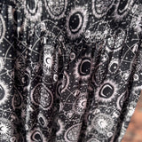 An up close image of the black Celestial Faux Wrap Pants.