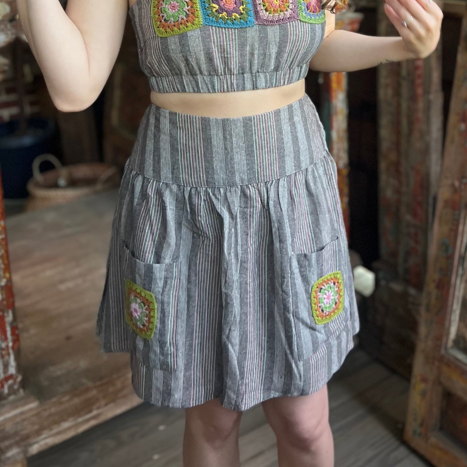 Someone wearing the Granny Square Mini Skirt.